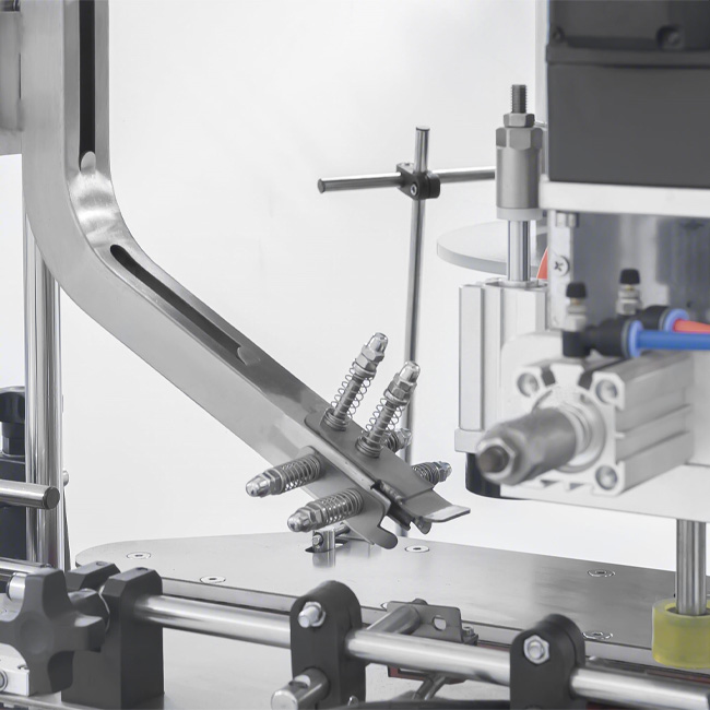 Укупорочная машина ленточного типа HED-DXG