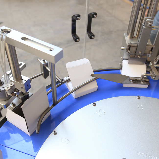 Вертикальная ротационная полуавтоматическая машина для упаковки в картонные коробки