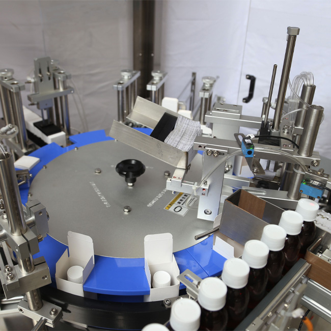 Вертикальная ротационная полуавтоматическая машина для упаковки в картонные коробки